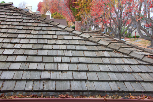 How do valleys, slopes, and penetrations affect roofing performance