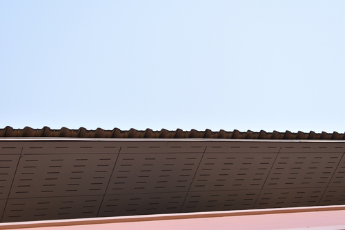What are signs of low slope roof problems